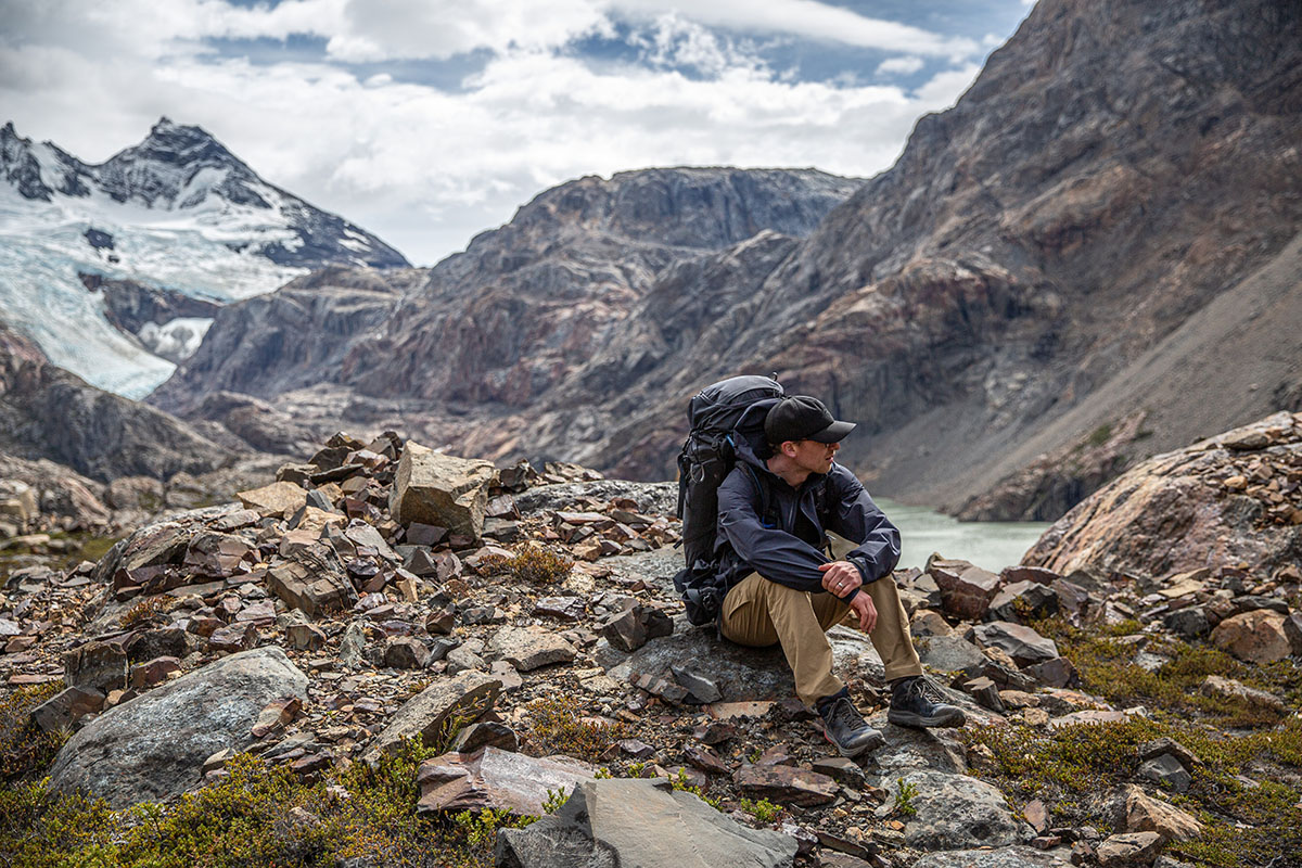 Gregory Baltoro 75 backpack (sitting on rocks by lake)